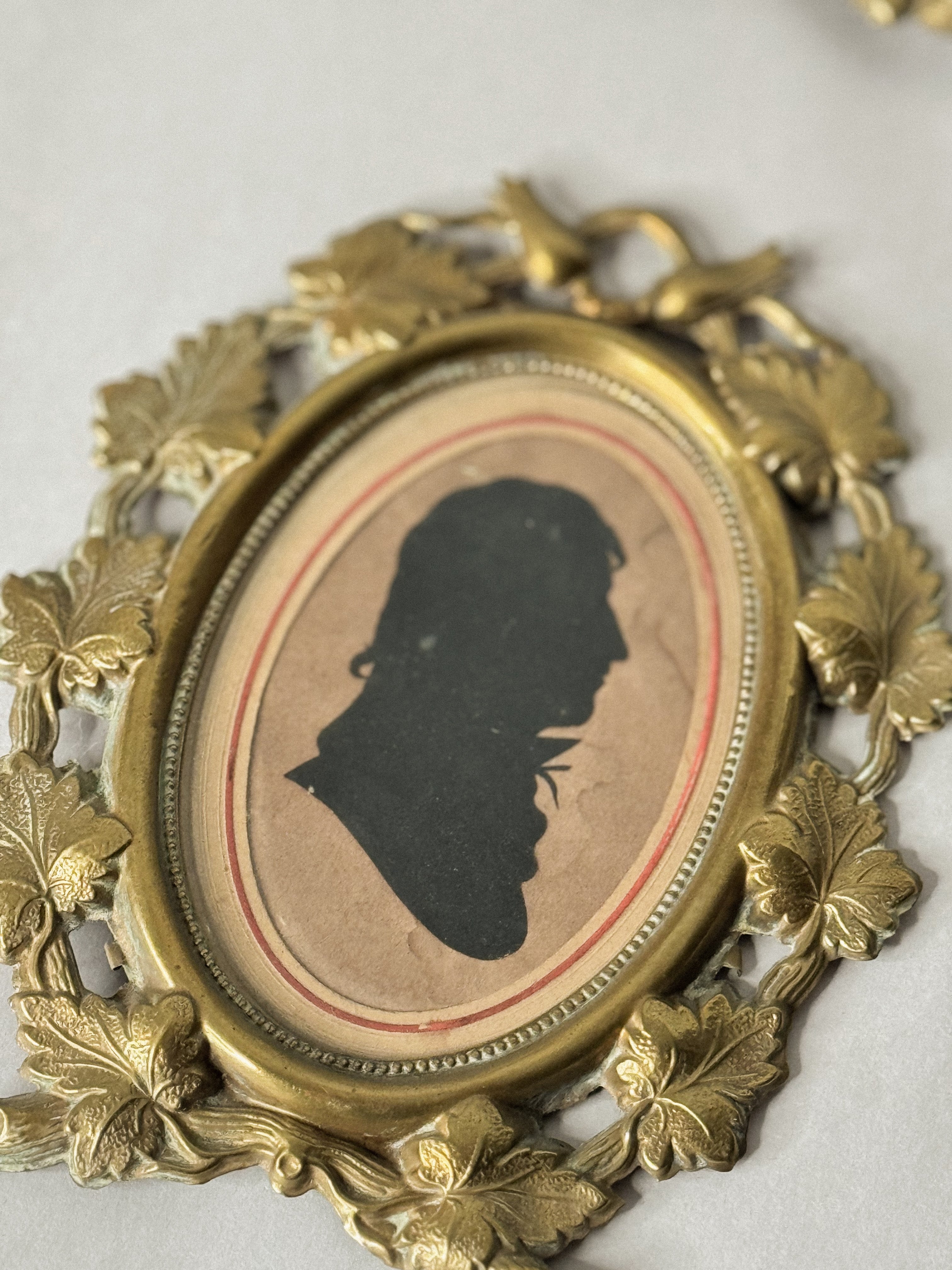 Pair of 19th-Century Silhouette Portraits in Romantic Brass Frames