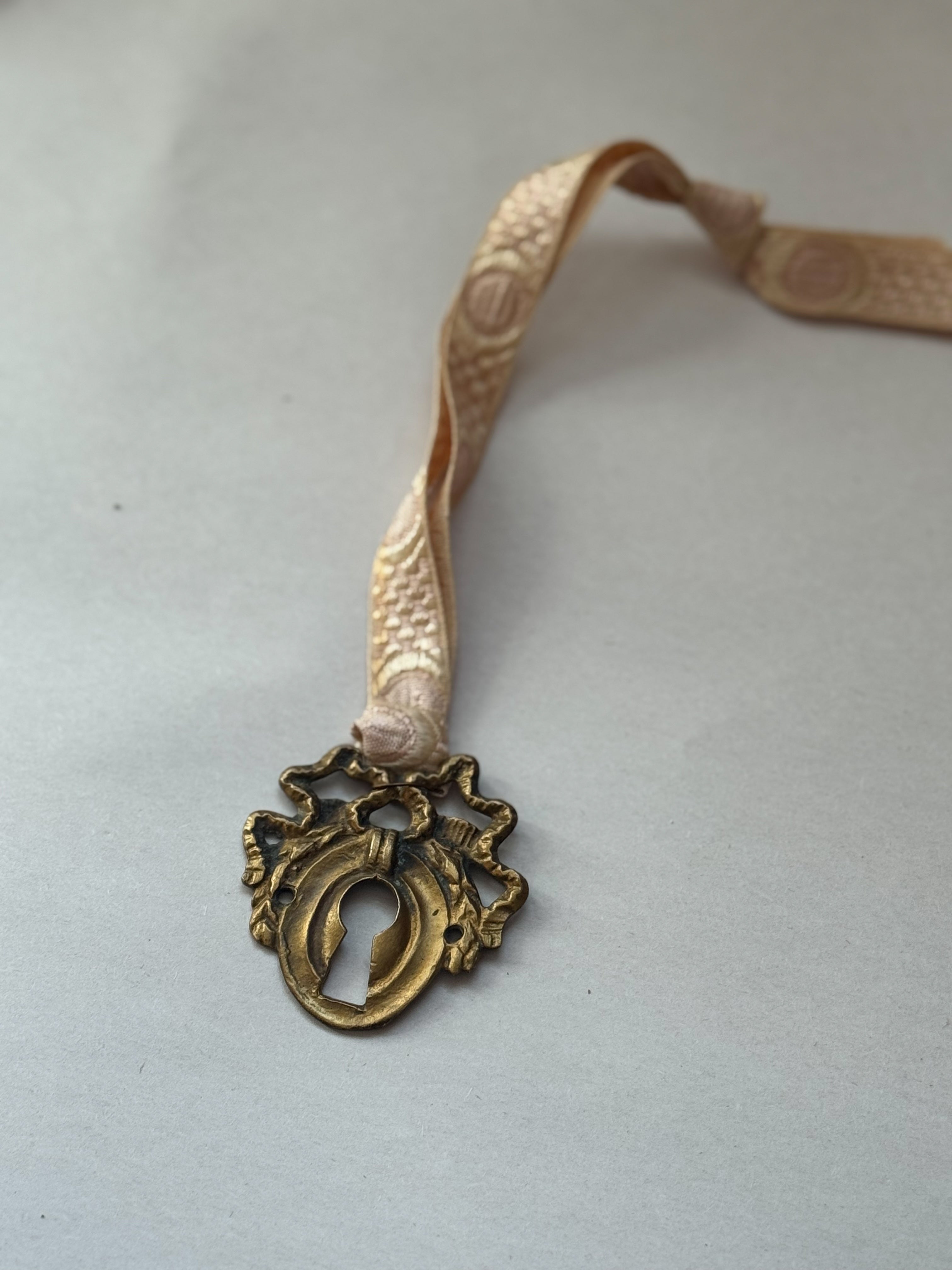 E: Antique French Escutcheon/Salvage Ornament on Antique Ribbon — Paris