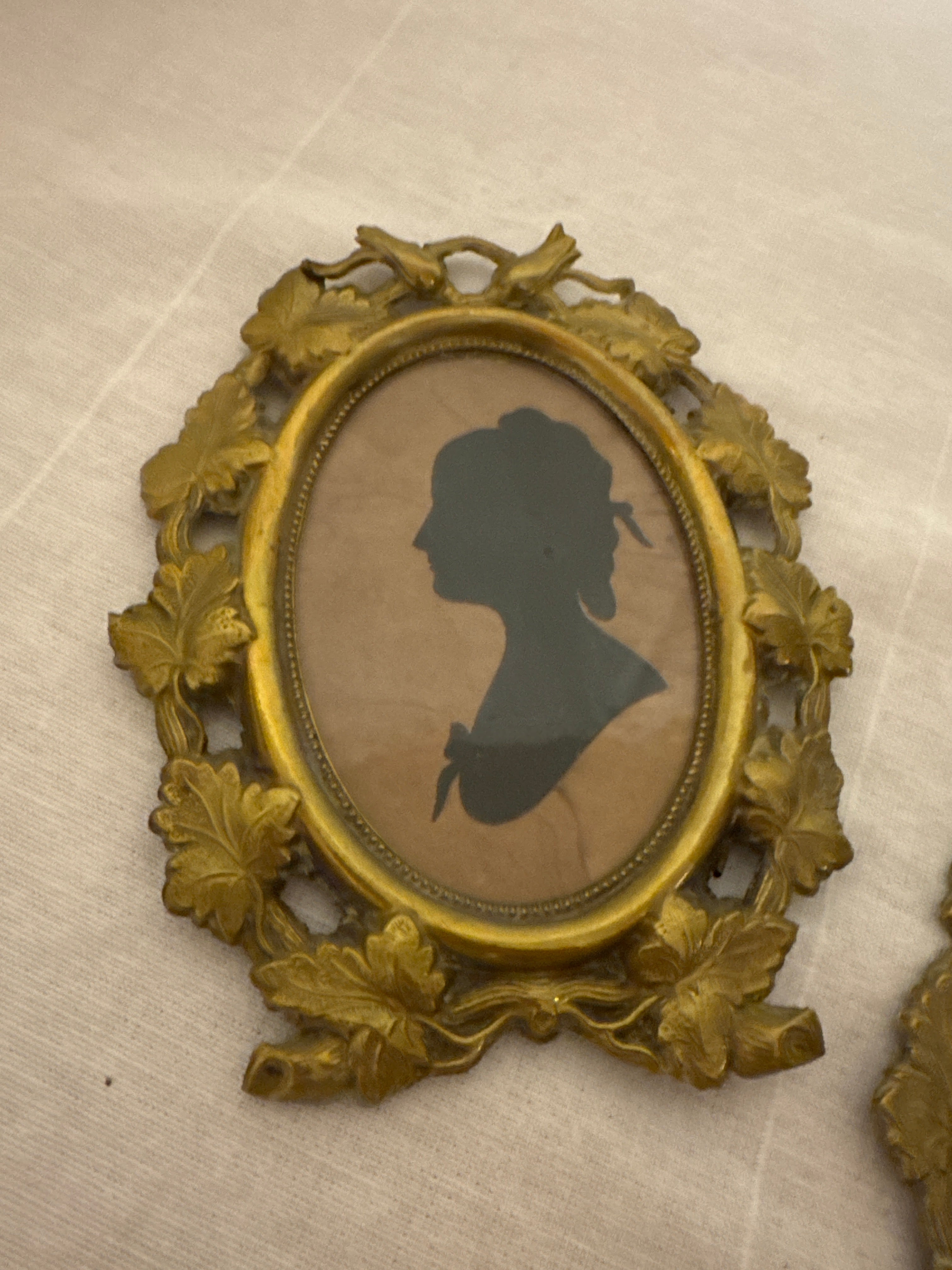 Pair of 19th-Century Silhouette Portraits in Romantic Brass Frames