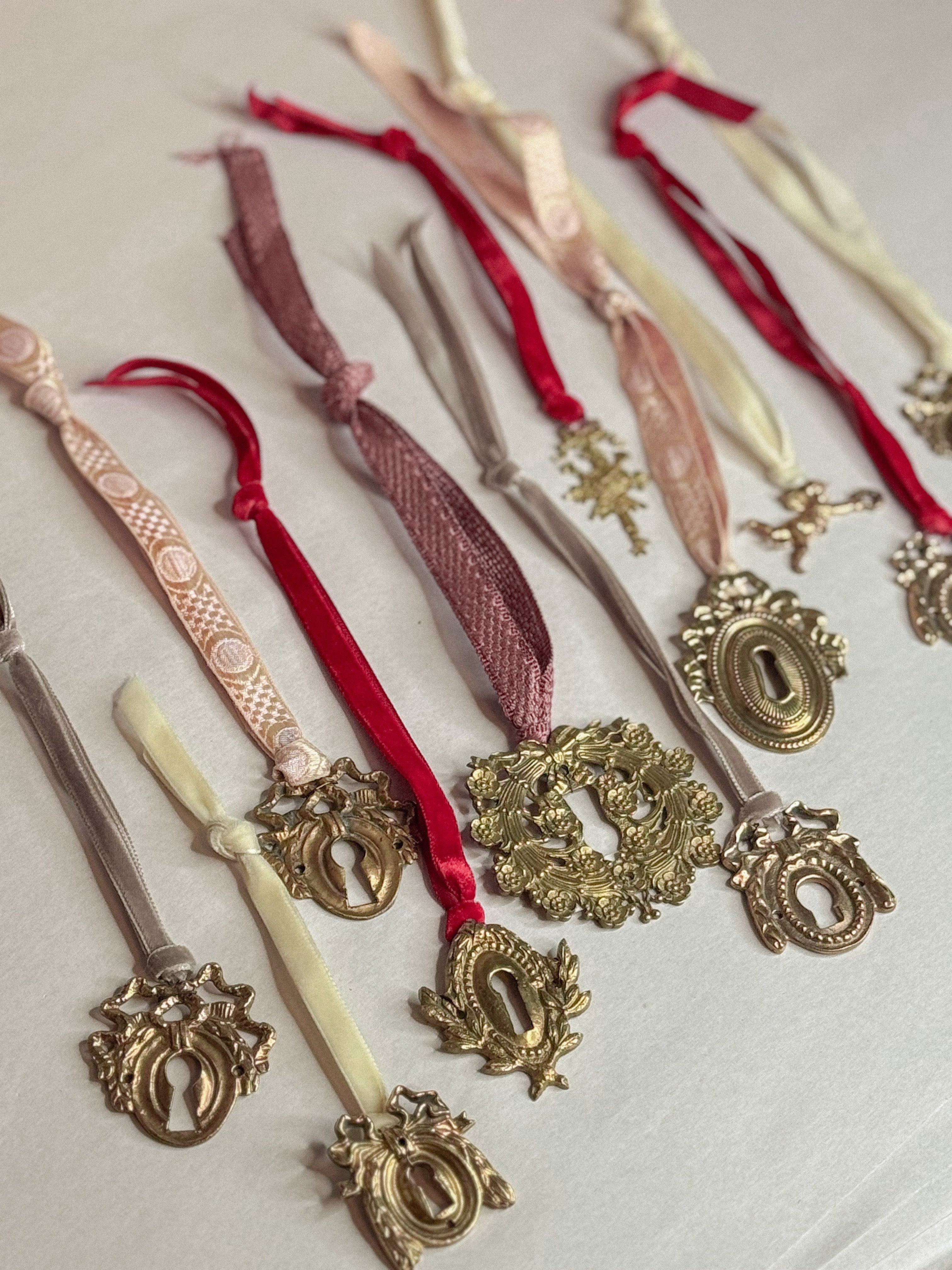 A: Antique French Escutcheon/Salvage Ornament on Antique Ribbon — Paris