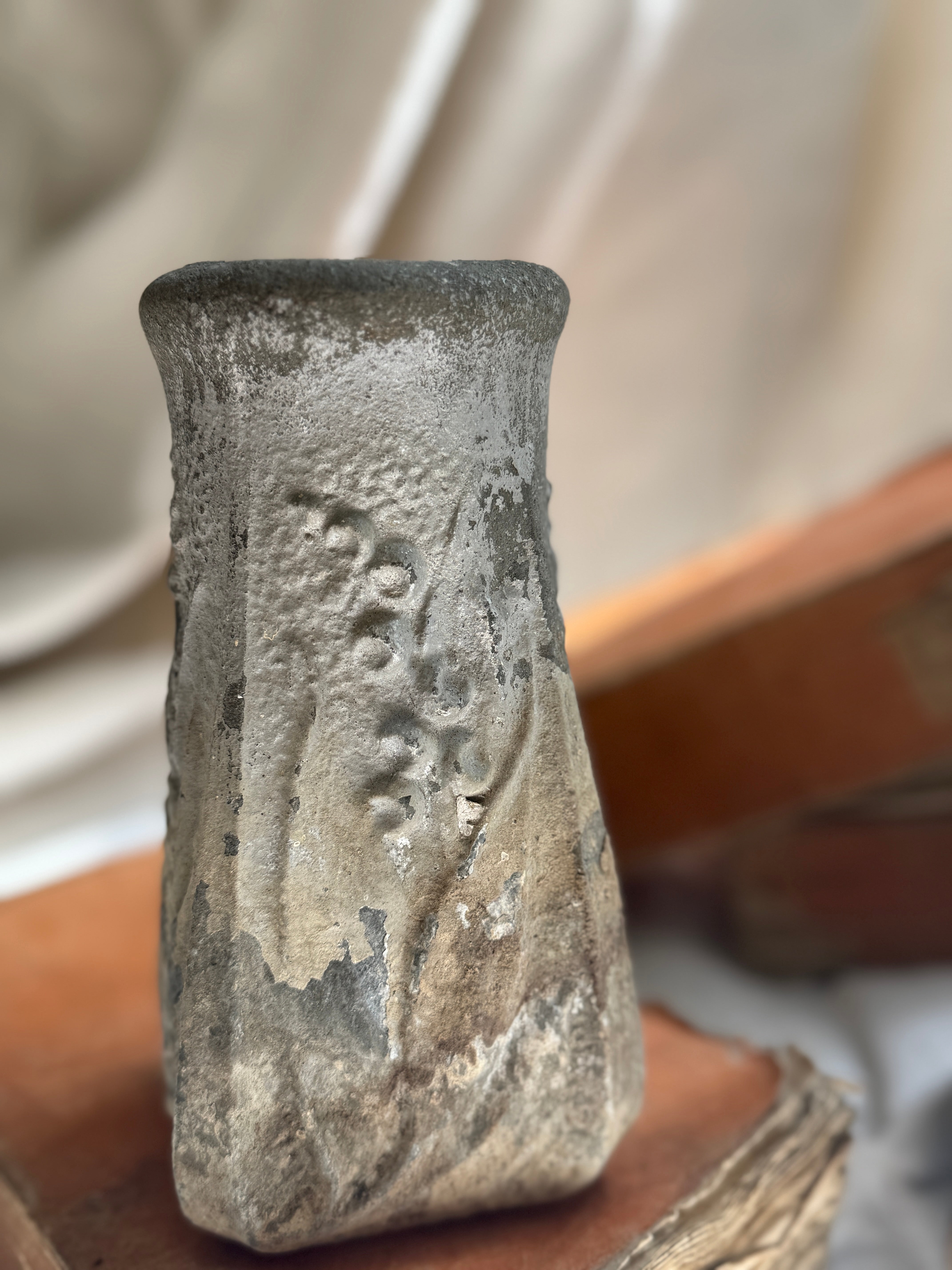 Weathered Cast Stone Vase with Floral Relief