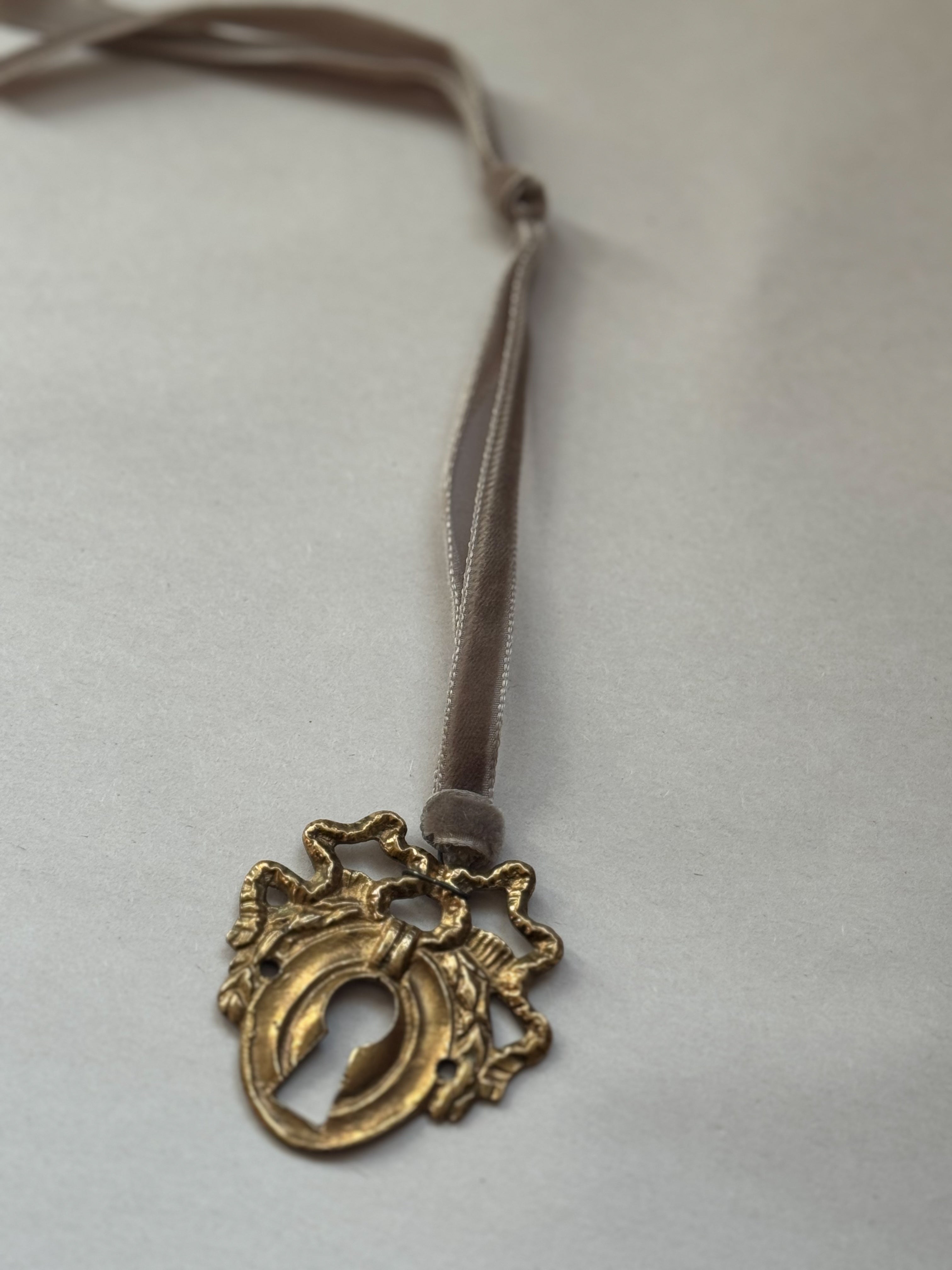 J: Antique French Escutcheon/Salvage Ornament on Antique Ribbon — Paris