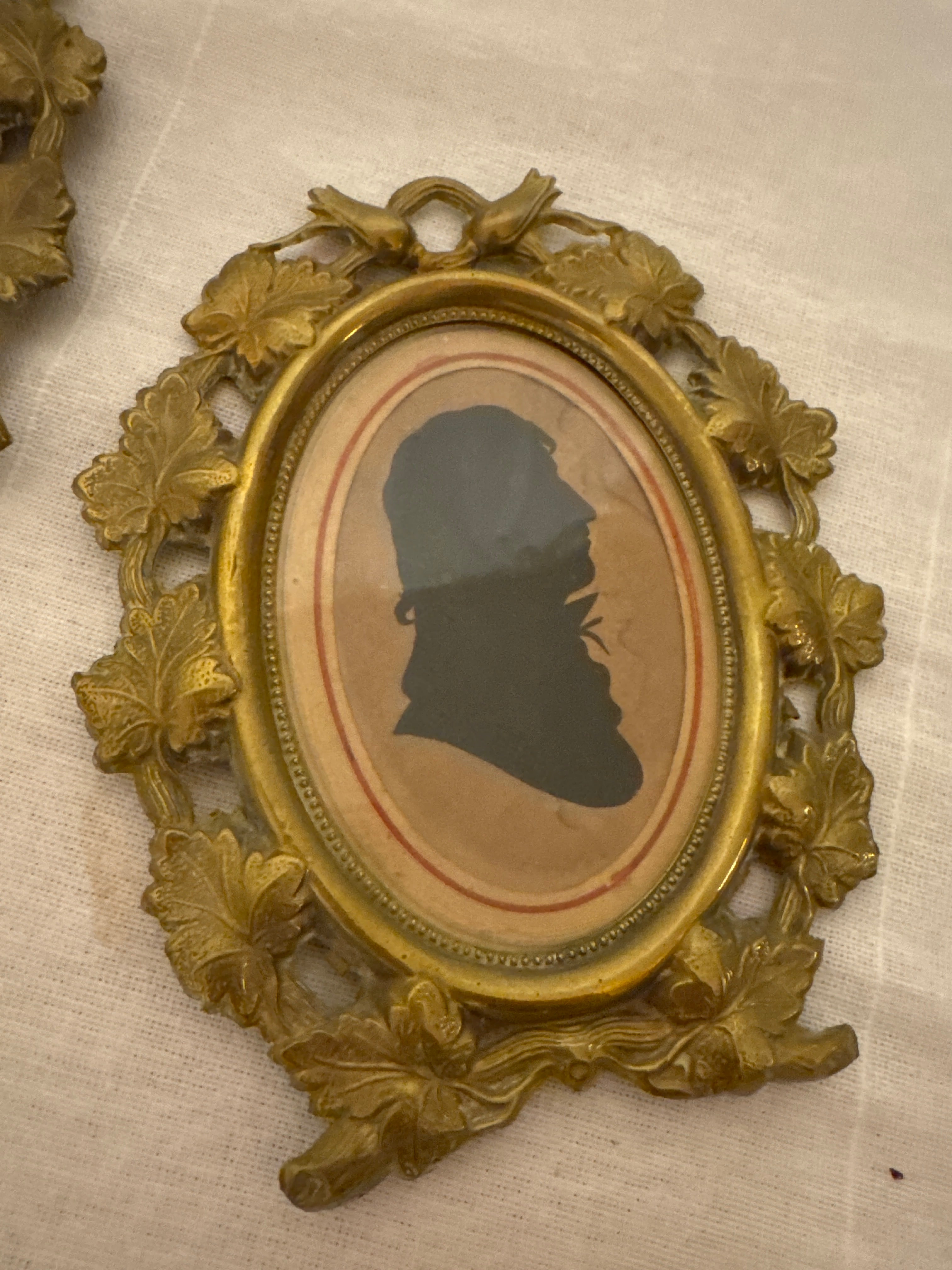 Pair of 19th-Century Silhouette Portraits in Romantic Brass Frames