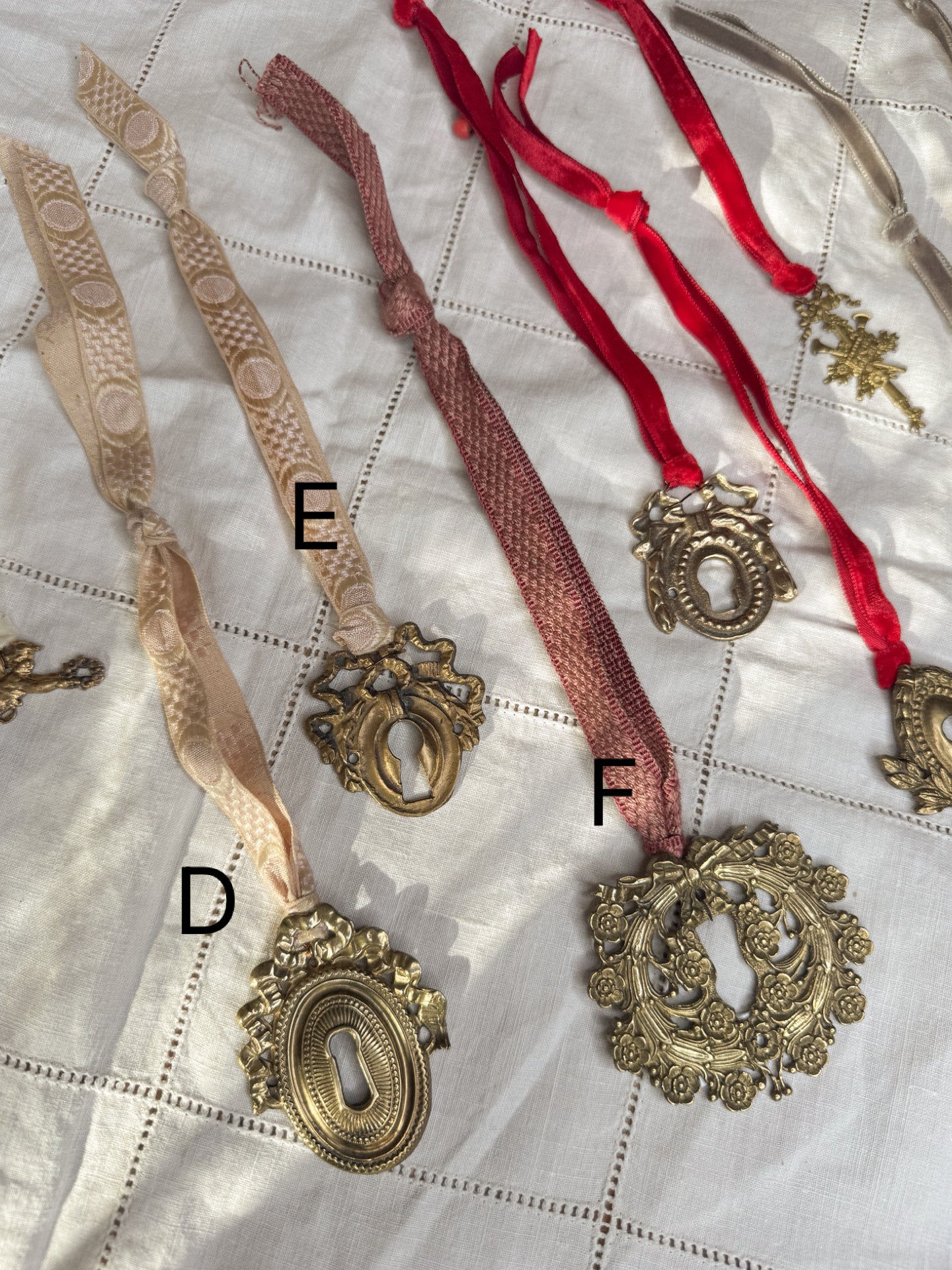 A: Antique French Escutcheon/Salvage Ornament on Antique Ribbon — Paris
