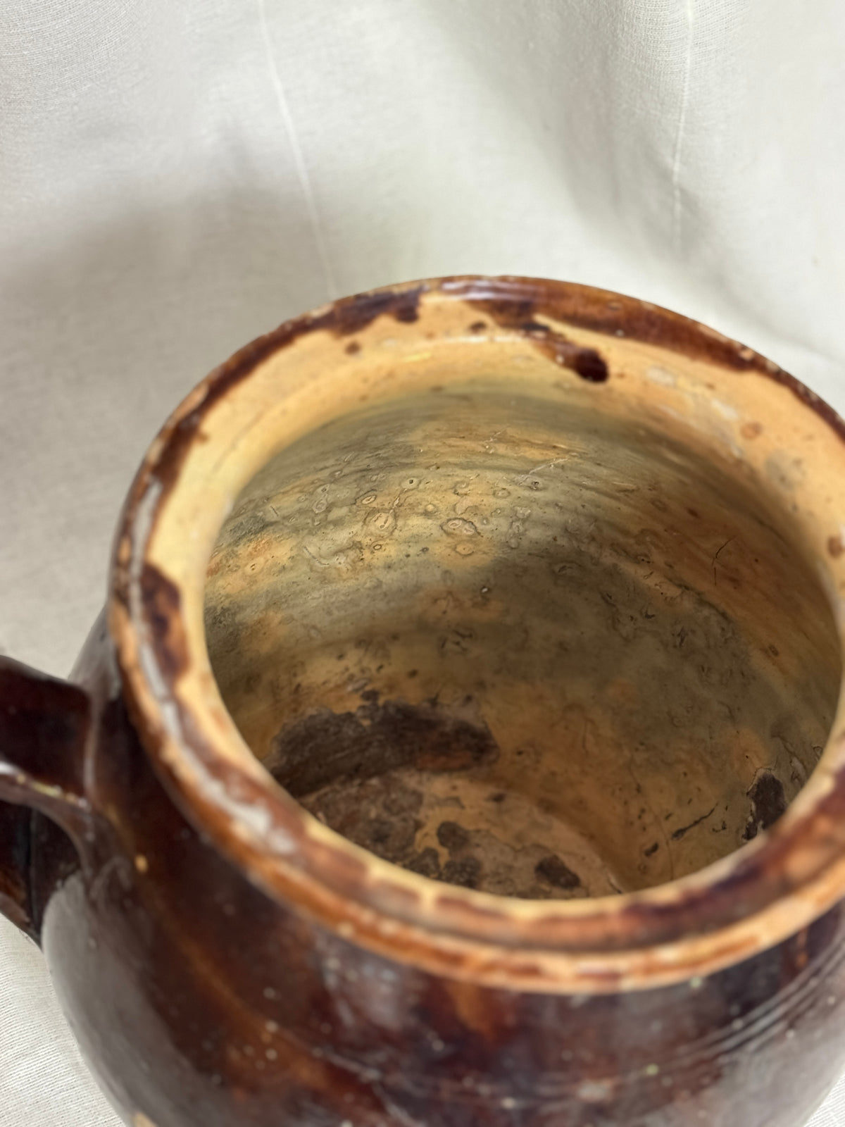 Antique French Dark Brown Glazed Earthenware Confit Pot with Strap Handle, 19th Century