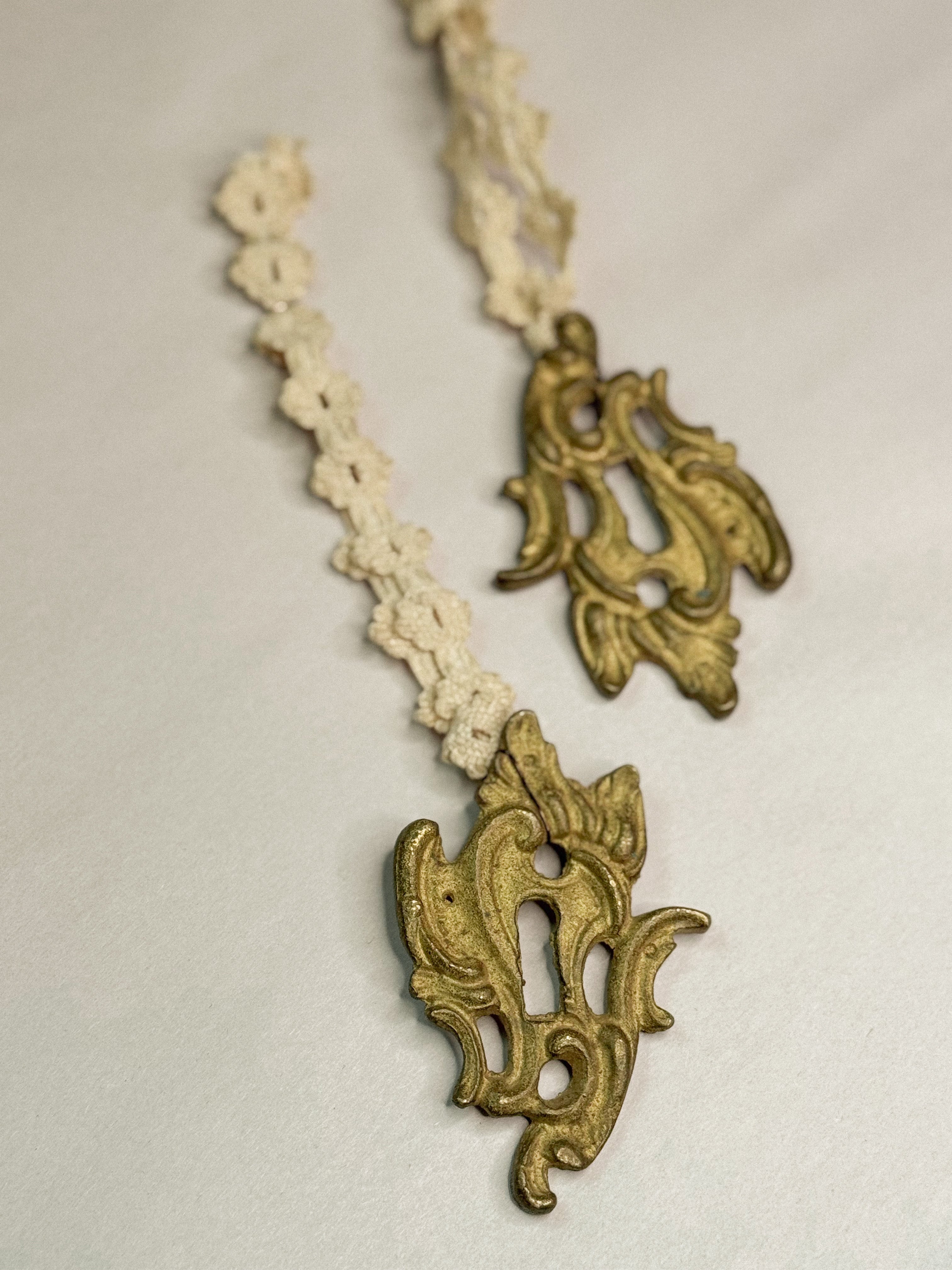 Ornament A: Escutcheon w lace