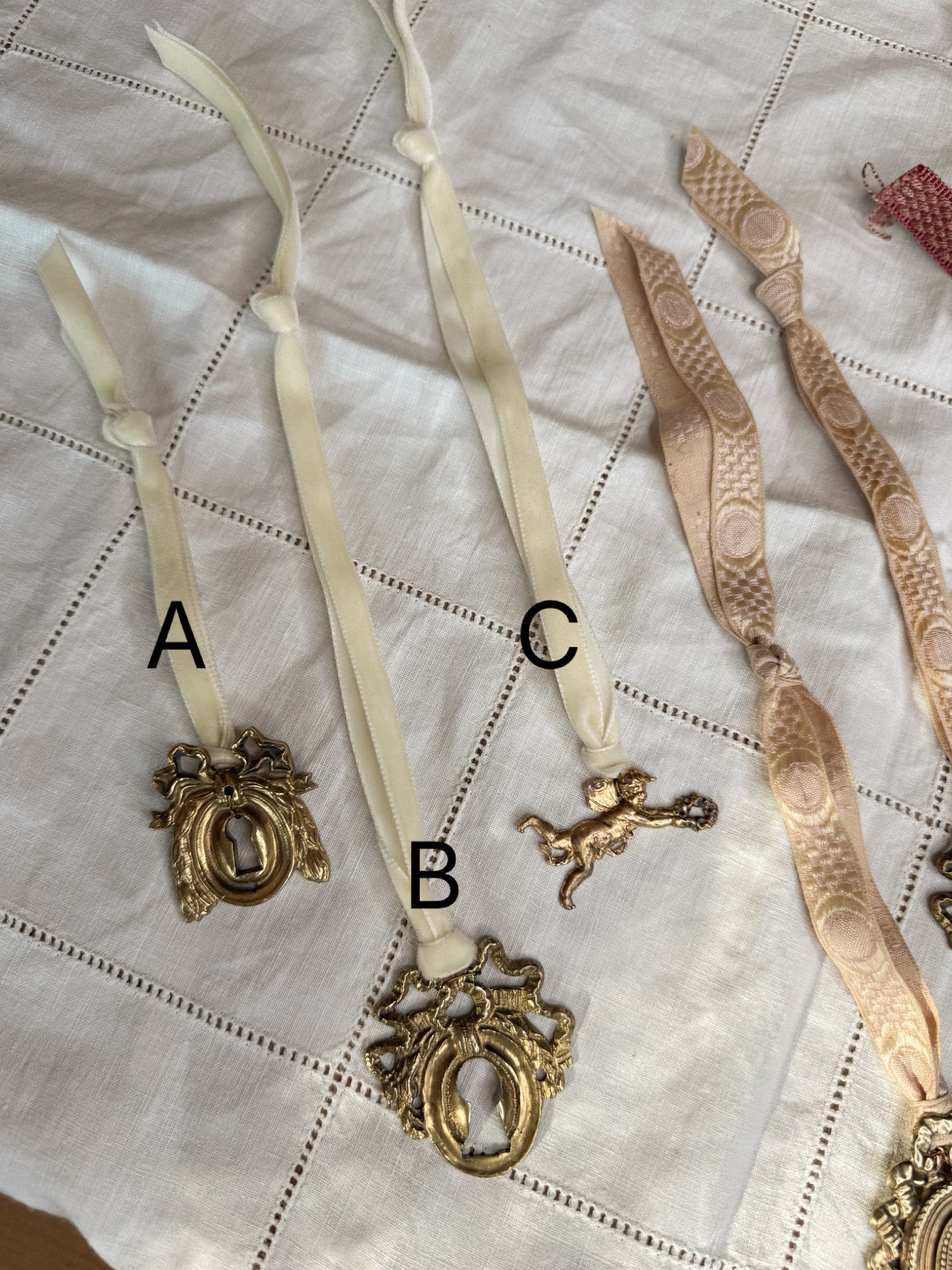 A: Antique French Escutcheon/Salvage Ornament on Antique Ribbon — Paris