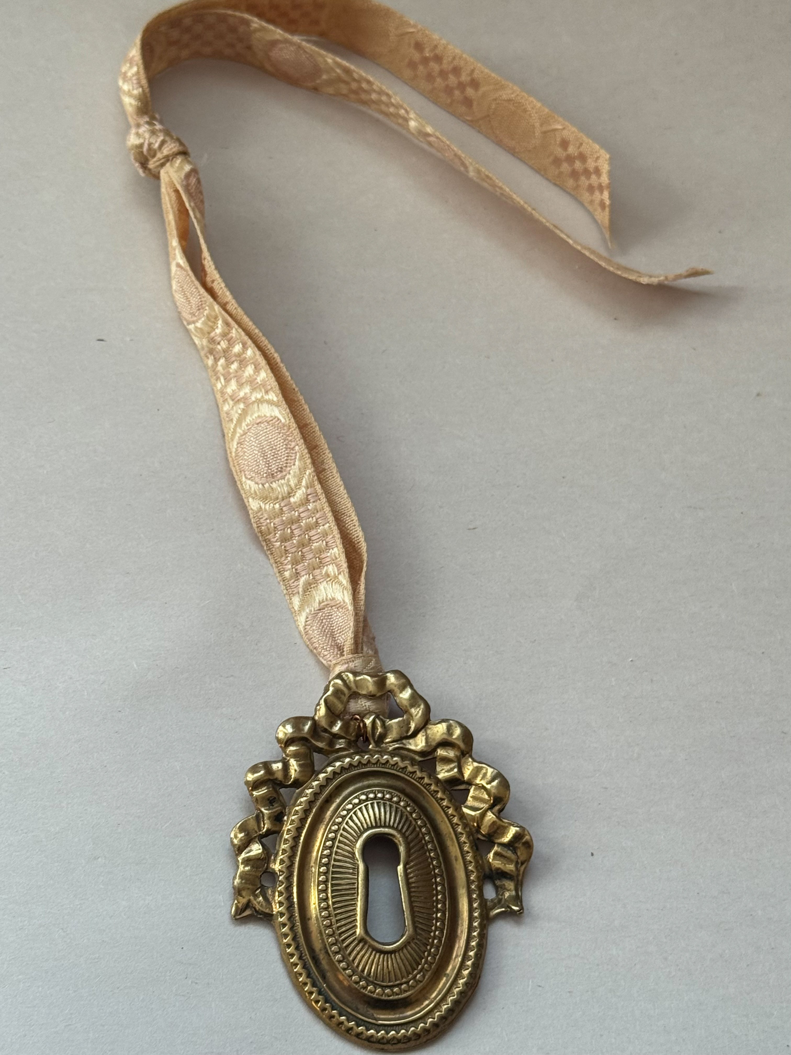 D: Antique French Escutcheon/Salvage Ornament on Antique Ribbon — Paris
