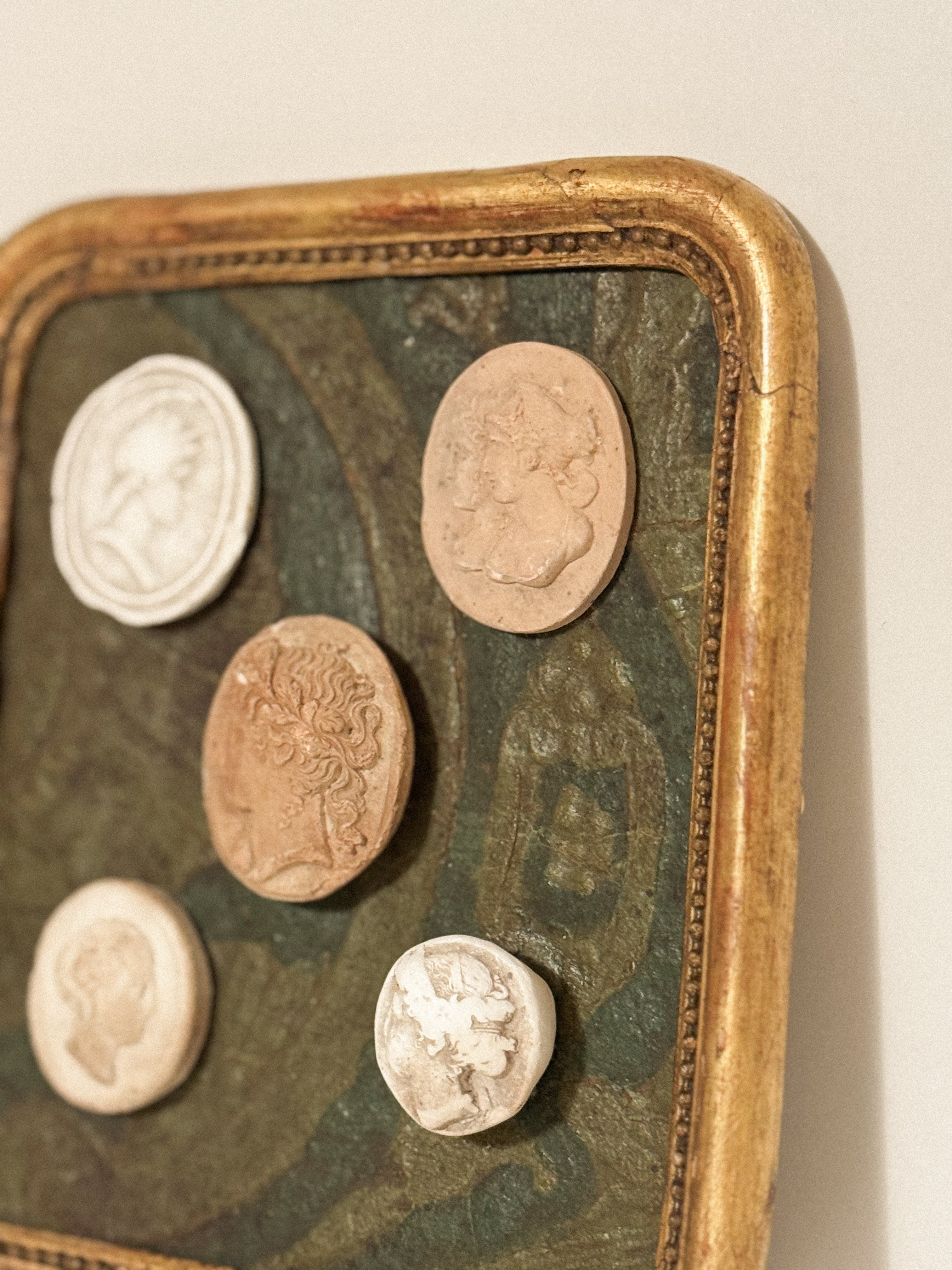 Antique tableau with plaster impressions